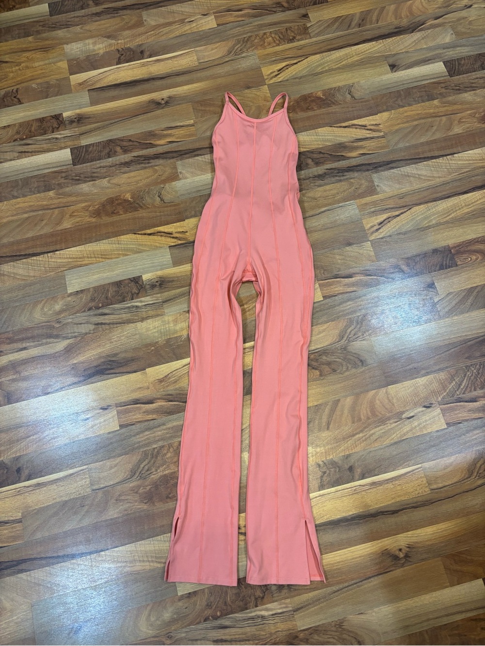 FP movement heat wave coral workout onesie romper with flare bottom open back